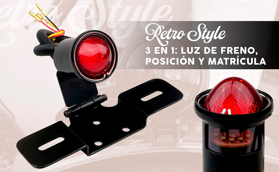 Piloto trasero para motos custom con soporte y luz de matrícula.